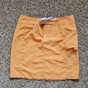 The North Face Orange Mini Skirt